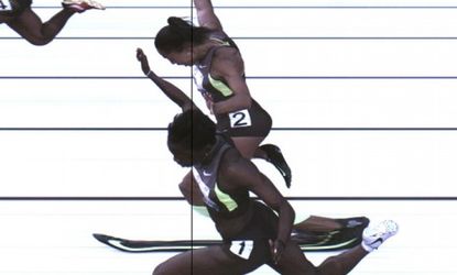 The third place photo-finish of the women's 100-meter final shows Allyson Felix and Jeneba Tarmoh (foreground) in a dead heat for the last spot on the U.S. Olympic team.