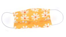 A fabric, handmade mask against a white background.
