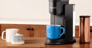 Keurig coffee machine and accessories on counter