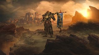 En bild från Diablo 3: Eternal Collection som visar en karaktär som står uppe på en kulle med en stad och en solnedgång i bakgrunden.