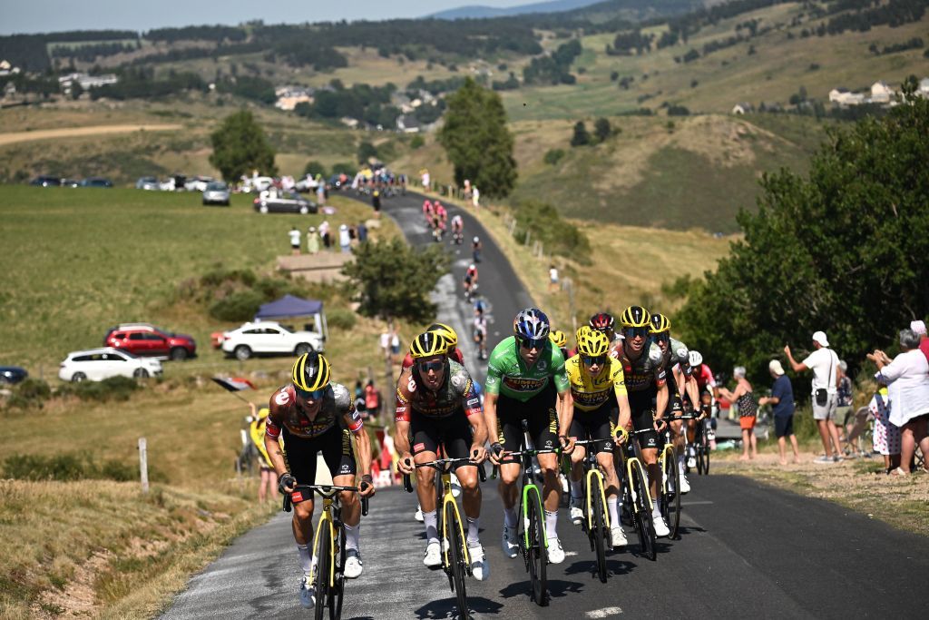 JumboVisma teams Slovenian rider Primoz Roglic L JumboVisma teams Belgian rider Wout Van Aert wearing the sprinters green jersey 3rd L and JumboVisma teams Danish rider Jonas Vingegaard 2nd R cycle with the pack of riders during the 14th stage of the 109th edition of the Tour de France cycling race 1925 km between SaintEtienne and Mende in central France on July 16 2022 Photo by Marco BERTORELLO AFP Photo by MARCO BERTORELLOAFP via Getty Images
