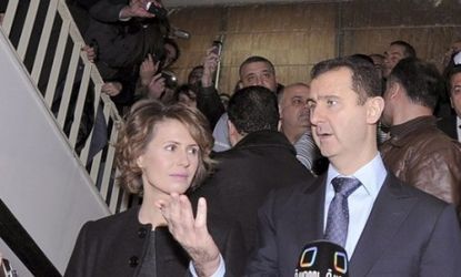 Syrian President Bashar al-Assad and his wife Asma: Secretary of State Hillary Clinton says that Assad could one day face a war crimes trial for his brutal assault on rebel opponents.
