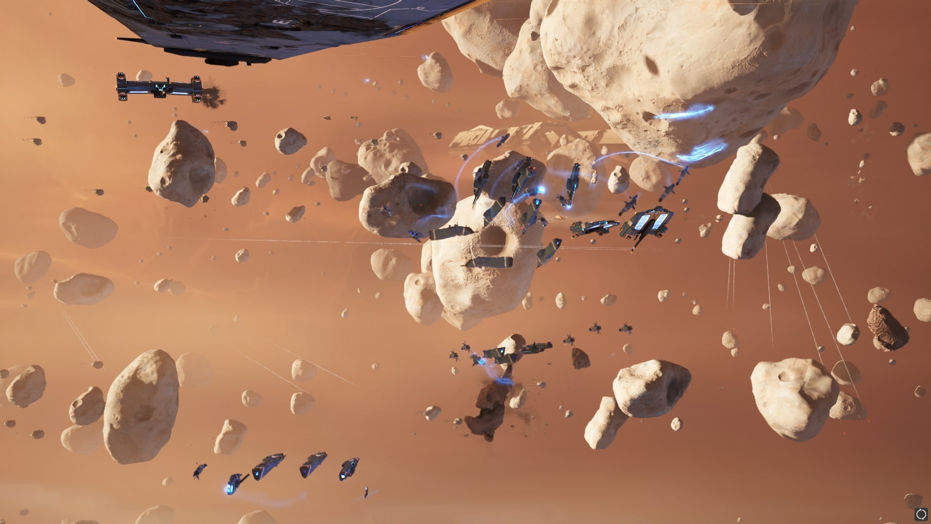 A battle happening in an asteroid field in Homeworld 3.