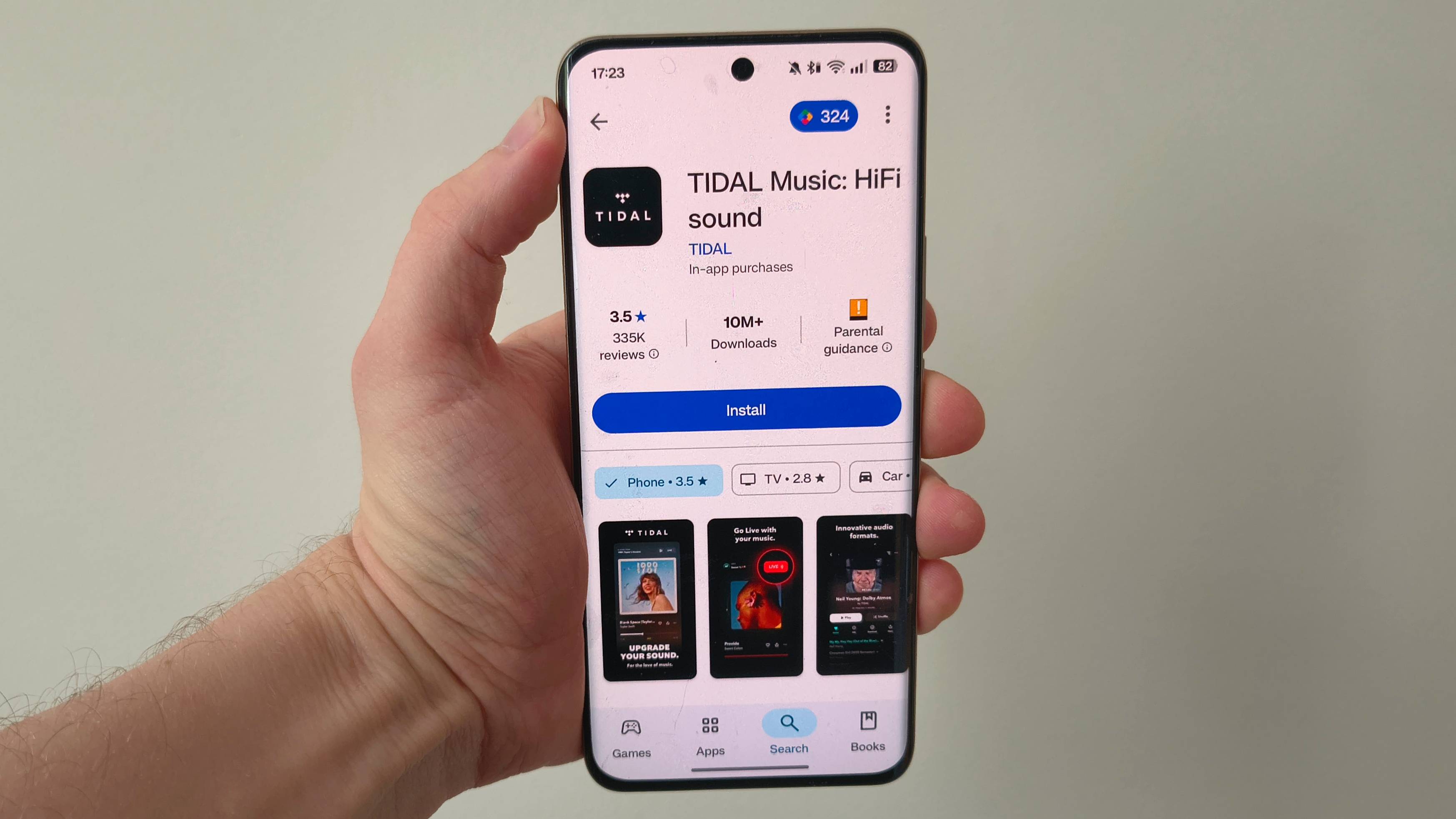 The Tidal app on the Play Store of an Android phone.