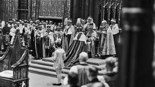 King George VI (1895-1952) receives the homage of the peers after his coronation ceremony, held at Westminster Abbey in London, England, 12th May 1937. The ceremony was conducted by British clergyman Cosmo Gordon Lang (1864-1945), Archbishop of Canterbury.
