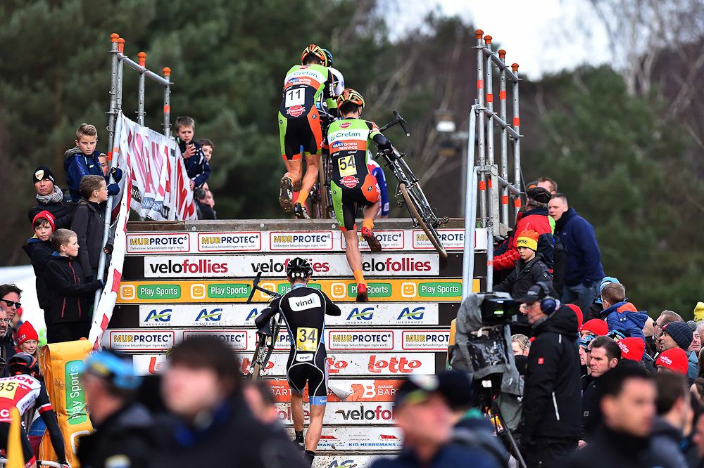 Riders ascend the flyover.