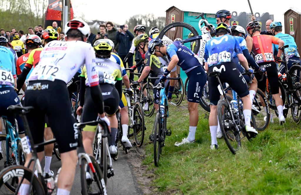 OUDENAARDE, BELGIUM - MARCH 31 : during the UCI World Tour Flanders Classics 108th Ronde Van Vlaanderen, a cycling race with start in Antwerpen and finish in Oudenaarde on March 31, 2024 in Oudenaarde, Belgium, 31/03/2024 ( Motordriver Kenny Verfaillie - Photo by Nico Vereecken / Photo News