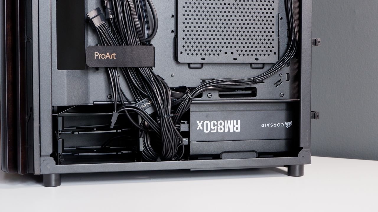 A gaming PC in the process of being built, using Radeon and Ryzen components and an Asus Pro Art PA401 PC case.