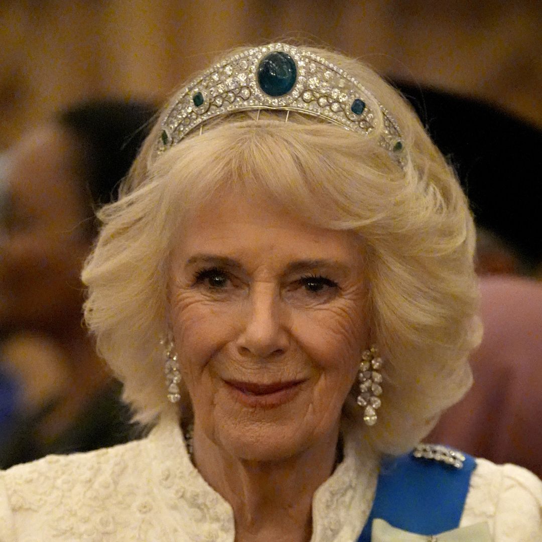 Queen Camilla wearing an emerald tiara 