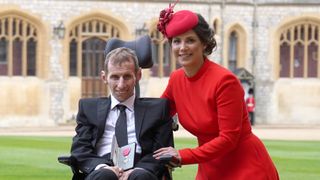 Robert Burrow with his wife Lindsey after he was made an MBE by the Princess Royal during an investiture ceremony at Windsor Castle on April 5, 2022