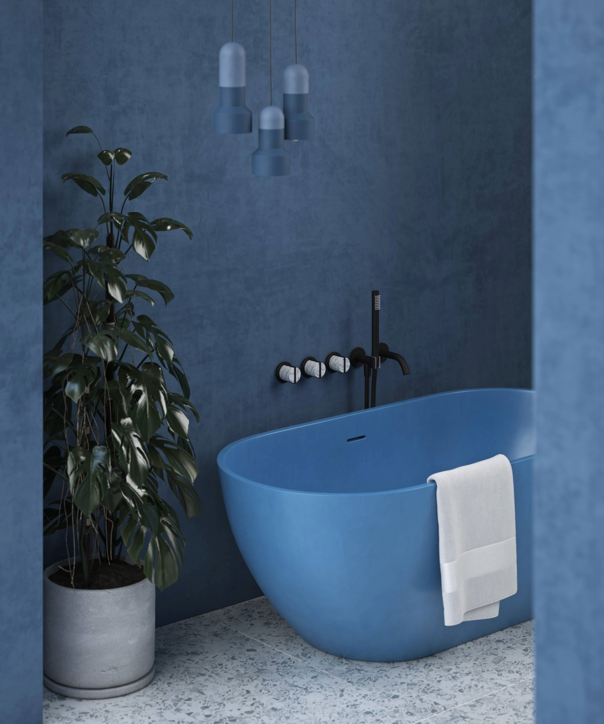Blue bathroom idea with bright blue freestanding bathub, pendant lighting and walls