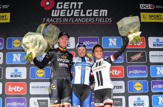 Lisa Brennauer, Chantal Blaak and Lucinda Brand celebrate on the podium at the end of Gent-Wevelgem