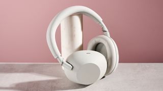 Sony WH-1000XM6 leaning on pole