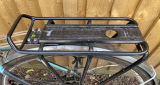 Topeak Babyseat II rack is shown top down mounted on the rear of a bike