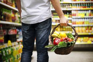 A man shops at a grocery store