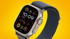 An Apple Watch Ultra 2 on an orange background