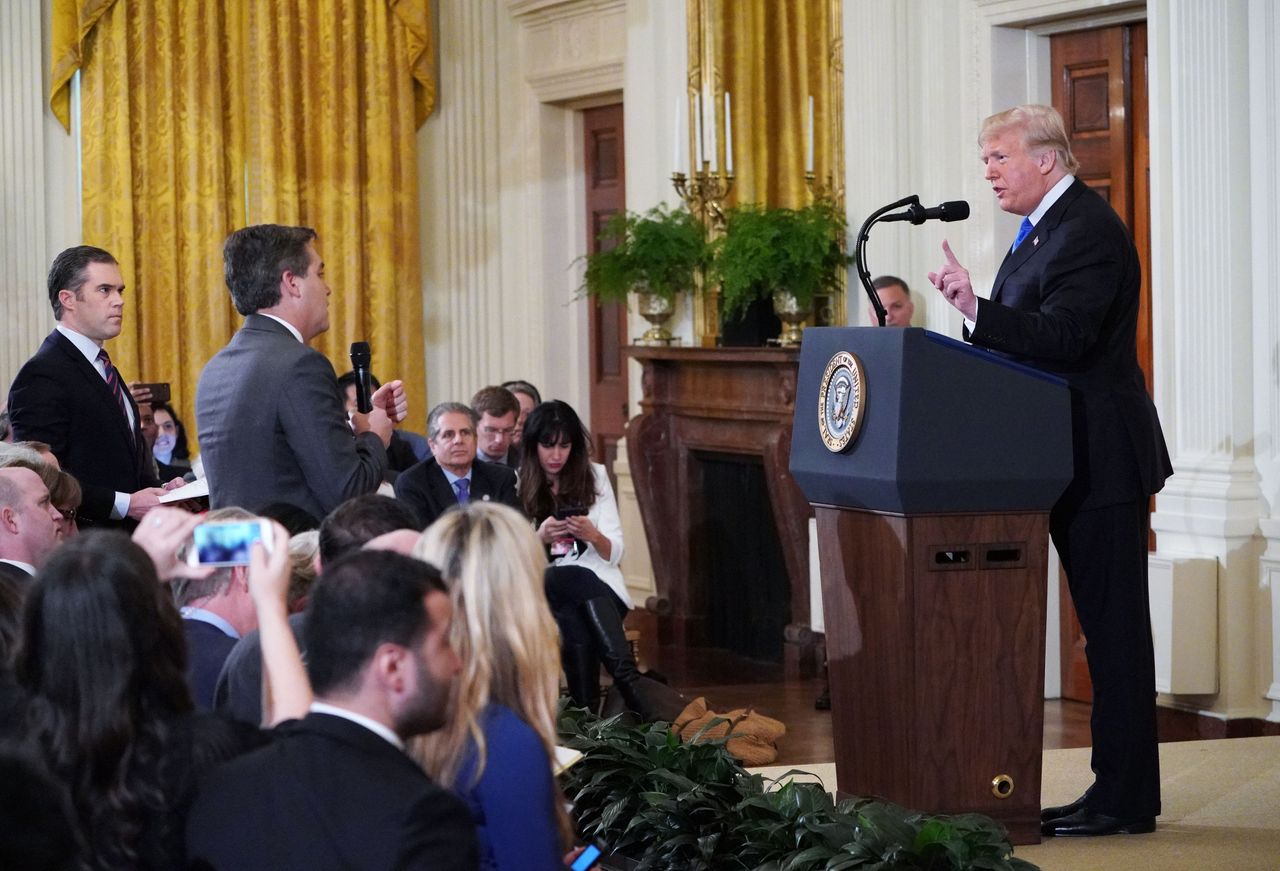 Jim Acosta and Donald Trump.