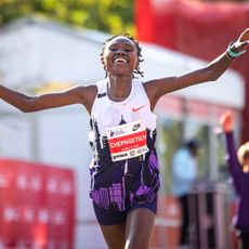 Ruth Chepngetich crossing the finish line of the Chicago Marathon to win and break the women's marathon world record