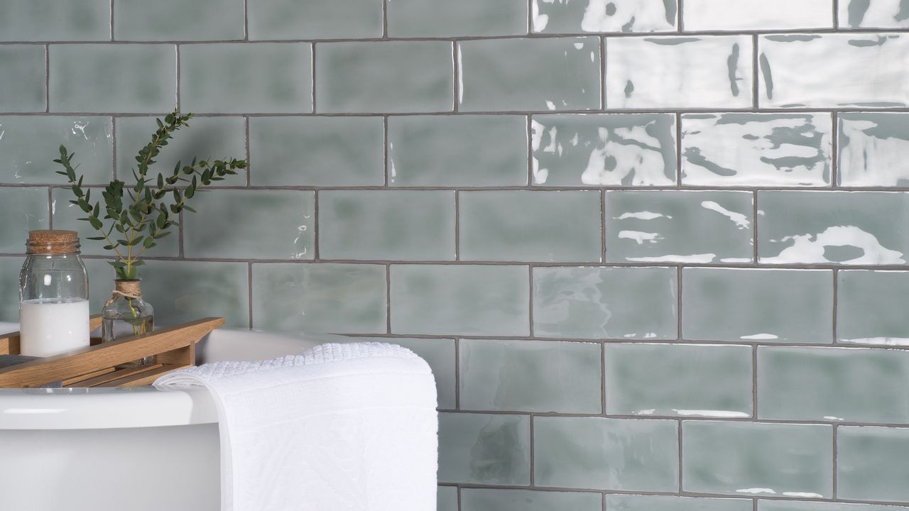 Green-gray metro tiles in a bathroom