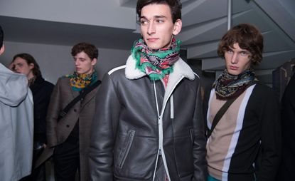 Group of male models wearing neck scarves