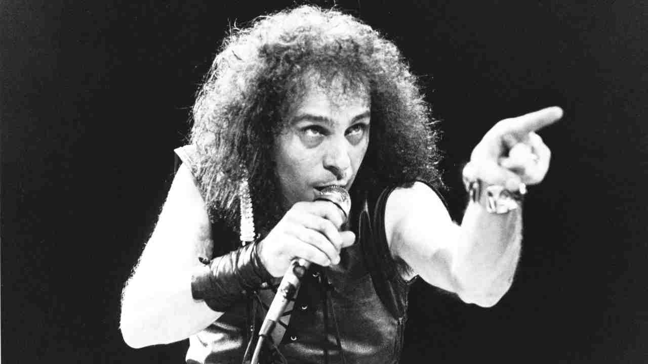 Dio performing onstage in the 1980s