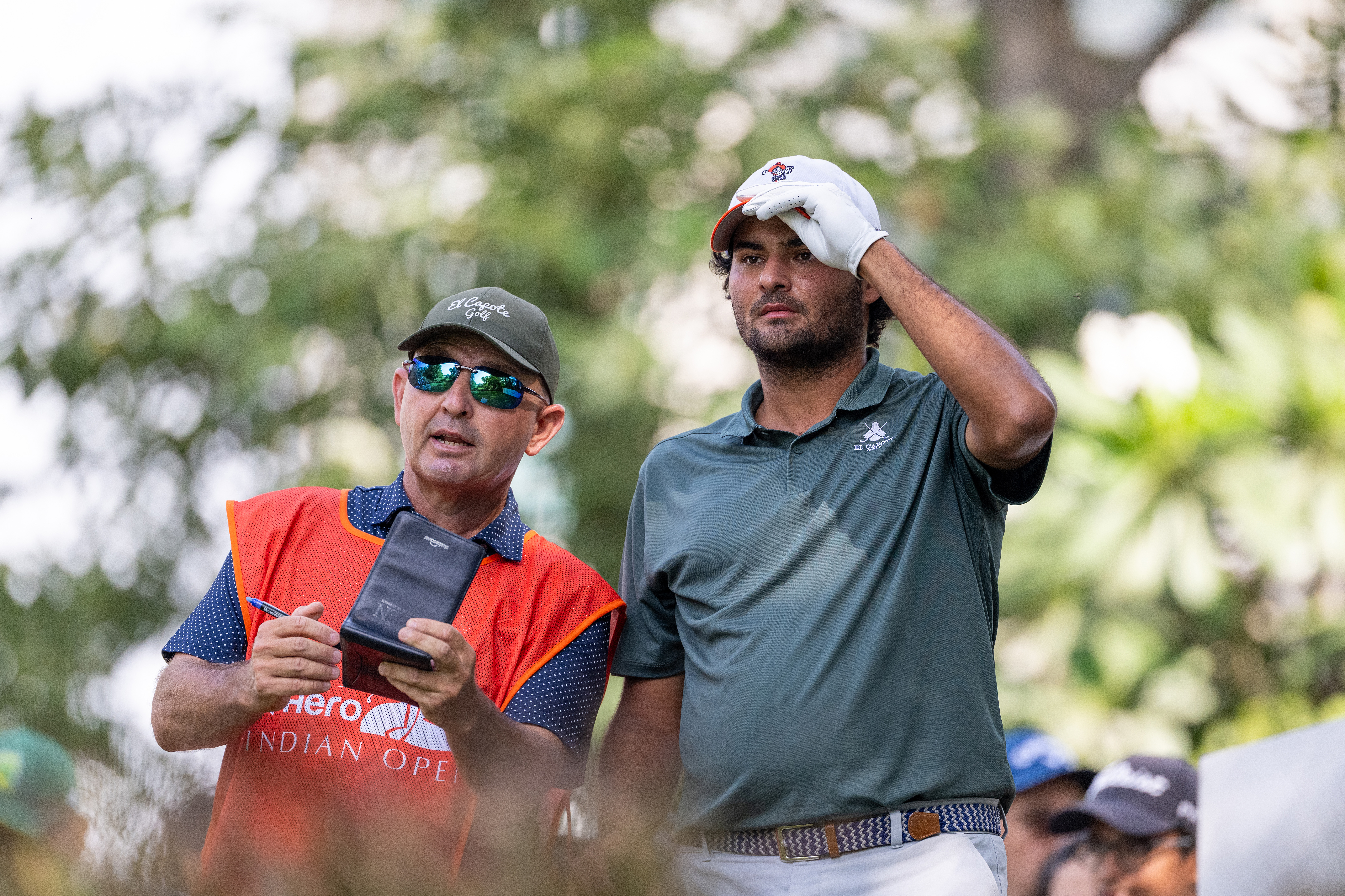 Eugenio Chacarra discusses his tee shot with his caddie on hole 4 on day four of the Hero Indian Open