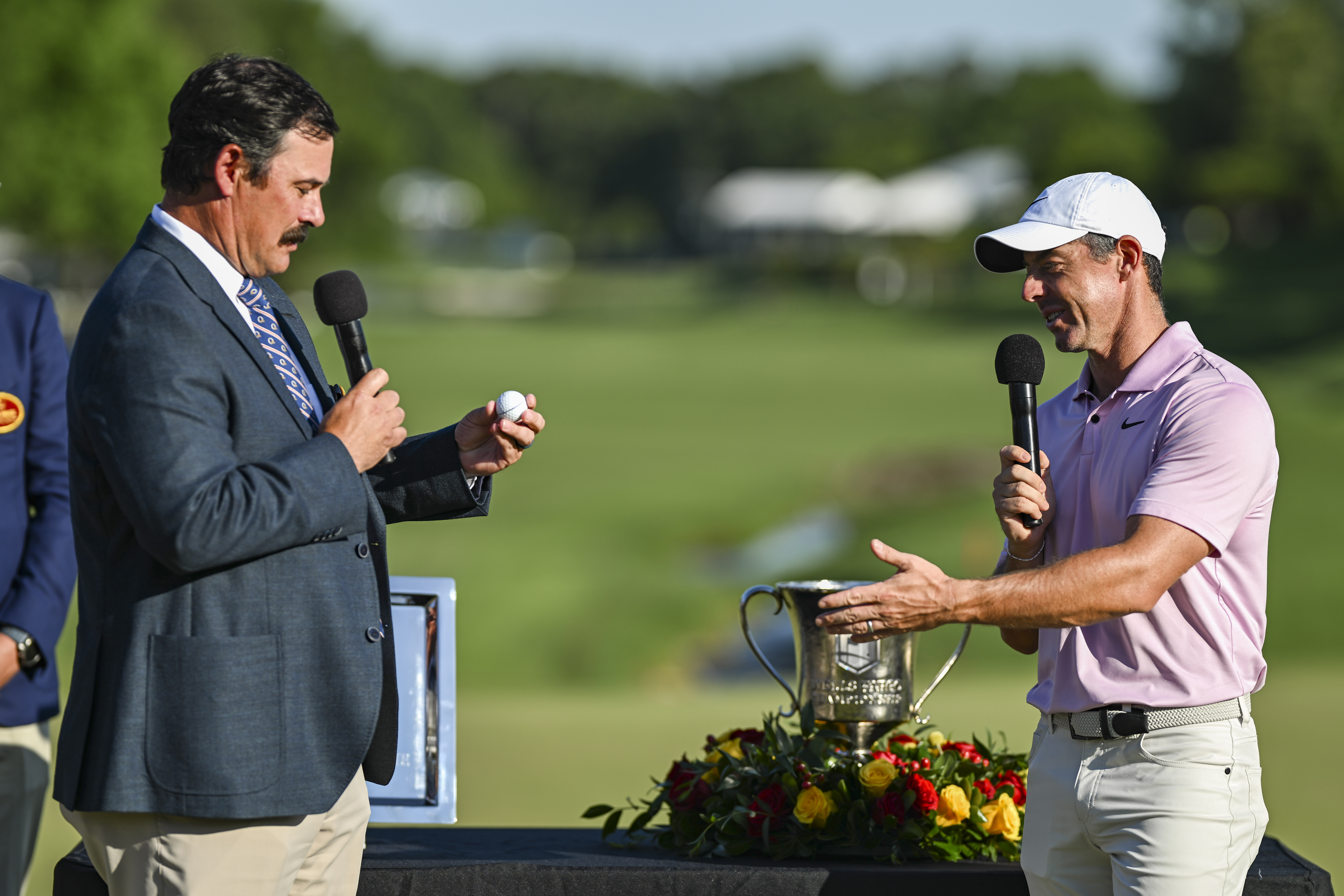 Johnson Wagner and Rory McIlroy chat at the 2024 Wells Fargo Championship