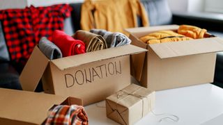 A donation box full of clothes