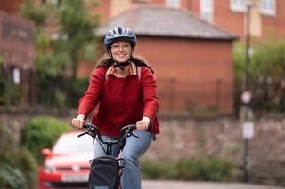 Female cyclist riding an electric bike