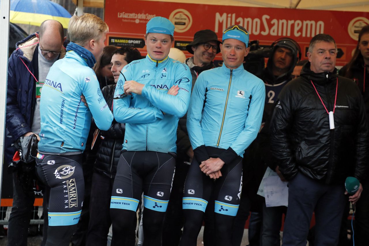 The Astana riders try to keep warm