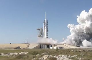 SpaceX's first Falcon Heavy rocket fires its 27 first-stage engines for the first time at Launch Pad 39A of NASA's Kennedy Space Center on Jan. 24, 2018. The static test fire was a major step toward the rocket's maiden flight later this year.