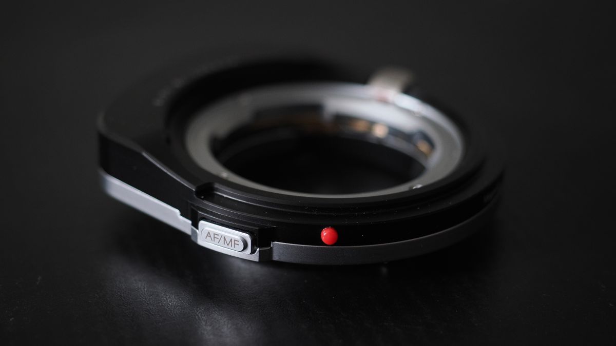 Megadap M2RF adapter on a black surface