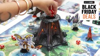 Someone places dice into a volcano on a board
