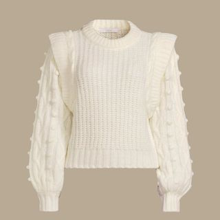 flat lay image of white bobble jumper