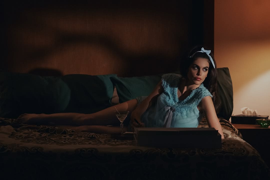 Kaia Gerber wore a blue babydoll dress in a behind-the-scenes picture from Palm Royale Season 2