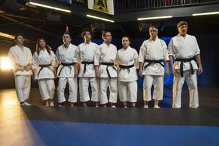 Gianni DeCenzo as Demetri, Oona O’Brien as Devon, Jacob Bertrand as Eli 'Hawk' Moskowitz, Xolo Maridueña as Miguel Diaz, Tanner Buchanan as Robby Keene, Mary Mouser as Samantha LaRusso, Ralph Macchio as Daniel LaRusso, William Zabka as Johnny Lawrence in Cobra Kai.