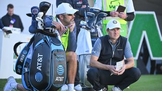 Jordan Spieth waits to take a tee shot at the WM Phoenix Open