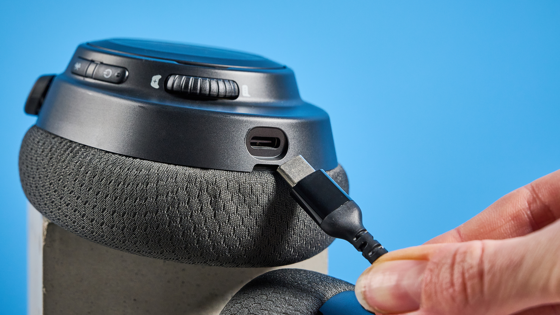 The SteelSeries Arctis Nova 7 Gen 2 against a blue background