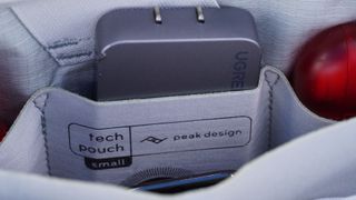 The logo on the inside of the Peak Design Small Tech Pouch.