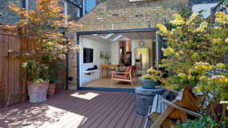single storey extension with bi fold door leading to decking
