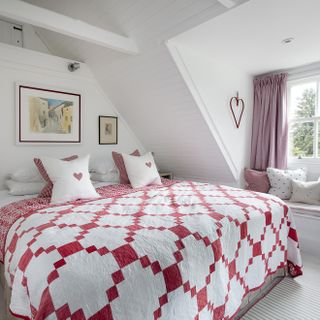bedroom with patchwork quilt in Penny Kennedy's Highland cottage from Period Living
