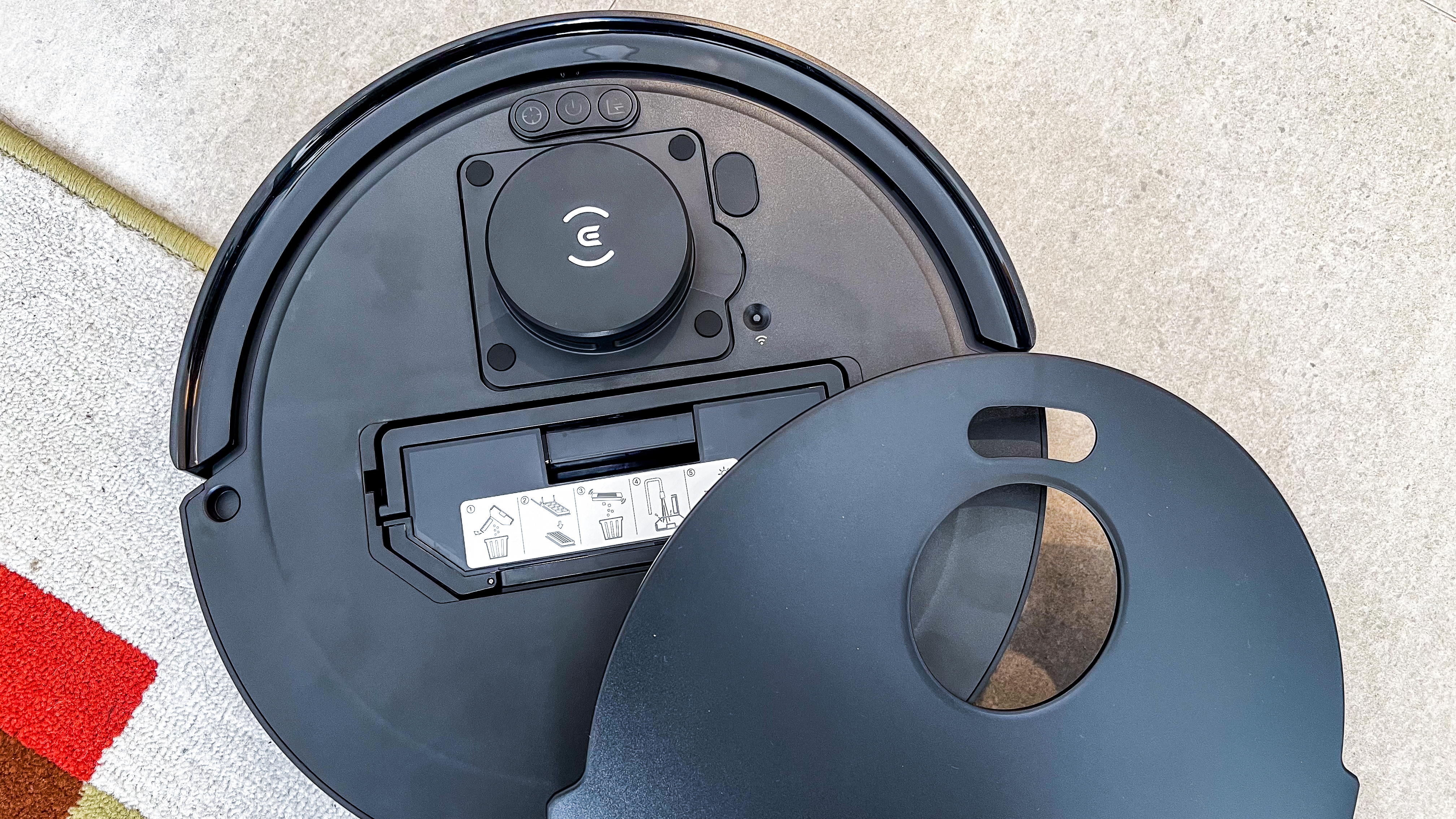 The top panel removed from the Ecovacs Deebot T30 Omni robot vacuum