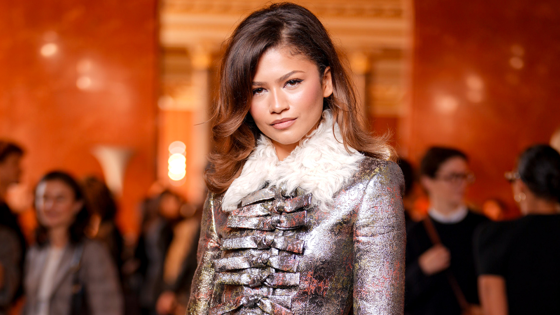 Zendaya broke her street style hiatus in a bright orange balaclava