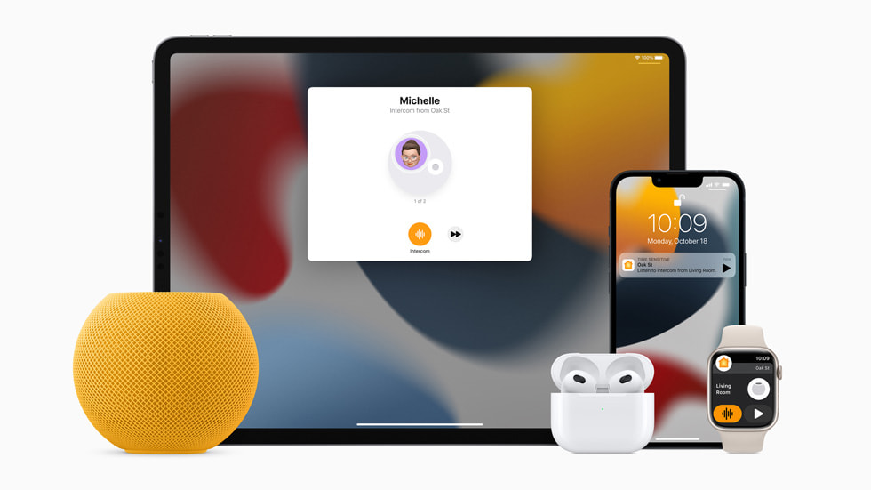 An image of the Apple HomePod Mini in yellow next to an Apple iPad, an Apple iPhone, Apple Airpods and an Apple Watch.