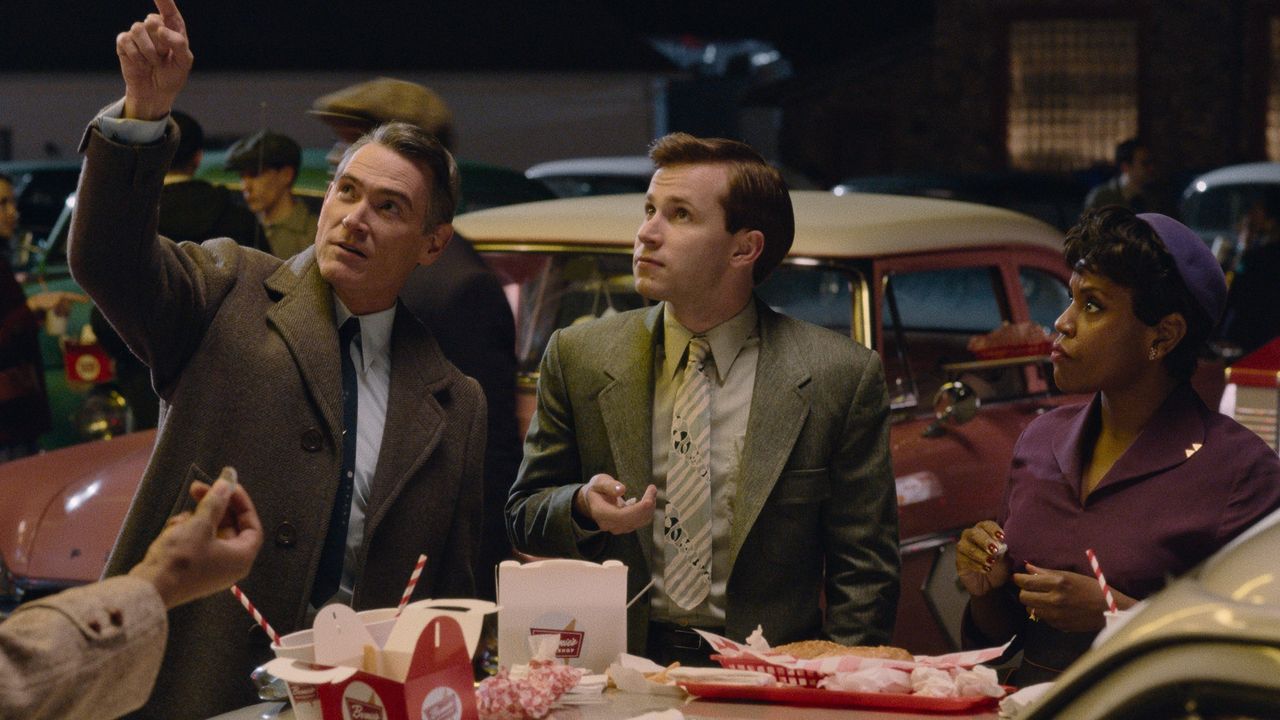 Billy Crudup points to the sky with Nicholas Podany and Haneefah Wood in Hello Tomorrow!