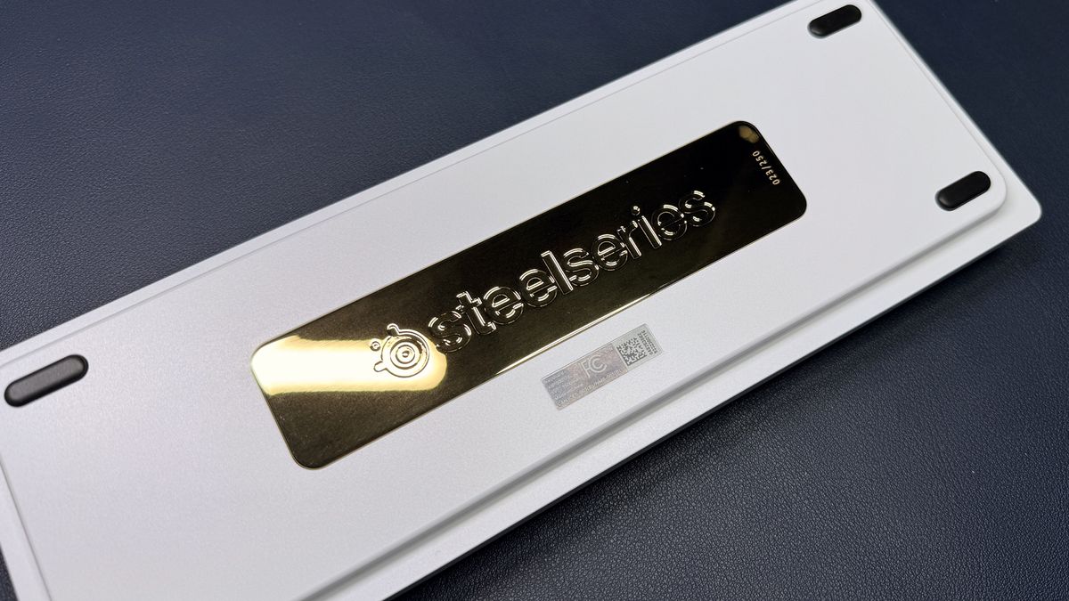 back of steelseries apex pro mini - white showing gold brass keyboard weight