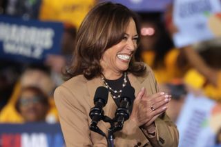 Kamala Harris wears a coconut brown suit while campaigning in Atlanta Georgia