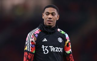 Anthony Martial warms up ahead of Manchester United's match against Chelsea