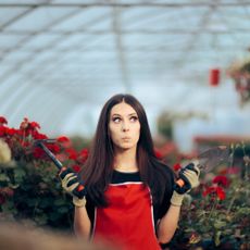 female gardener looking unsure