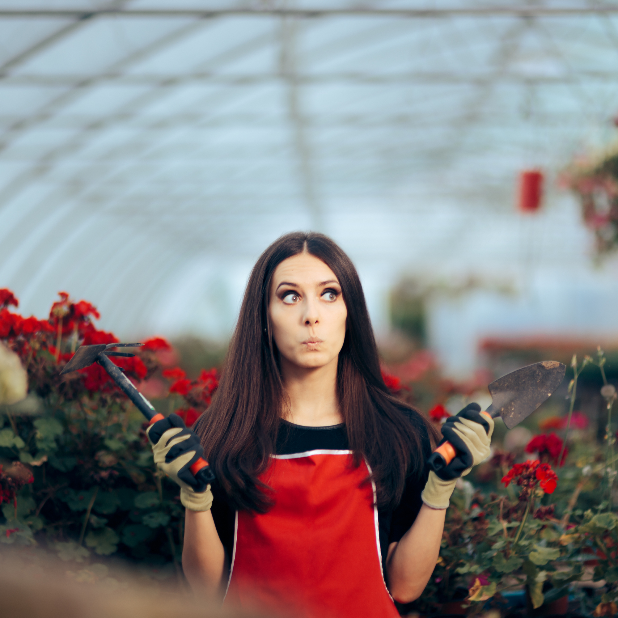 female gardener looking unsure